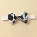 Baby Girls Three Pieces Clothes Outfit, Round Neck Fly Sleeve Tops + Milk Cow Printed Suspender Shorts + Headband. 