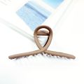 Korean version high end alloy solid color with versatile temperament simple and minimalist style shark shaped hair clip at back of the head. 