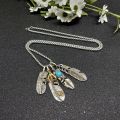 Dong Chen necklace couple feather Japanese Korean new pendant leaf brand Takahashi style eagle claw hip hop men and women. 