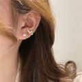 Sanhe pearl fish tail gold silver S Korean earrings with elegant personality luxurious and lightweight suitable for women. 