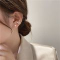 Sanhe pearl fish tail gold silver S Korean earrings with elegant personality luxurious and lightweight suitable for women. 
