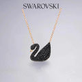 SWAROVSKI Iconic Swan Necklace and Earrings Collection, Rose Gold Tone Finish, Black Crystals. 