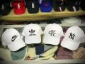 White famous logo design cap men. 