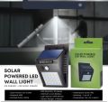 solar-powered LED wall light equipped with a motion sensor.. 
