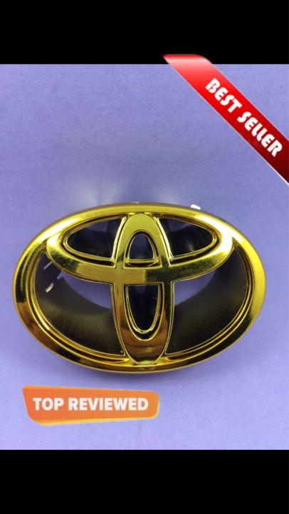 Toyota monogram logo, emblem, trademark, sign, mark, symbol, stamp, monogram, motif, badge, design, shield or figure
