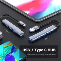 Aluminum Alloy Splitter Multi-function One Drag Four Hubs Hub Expander High-speed Computer Multi Interface Dock. 