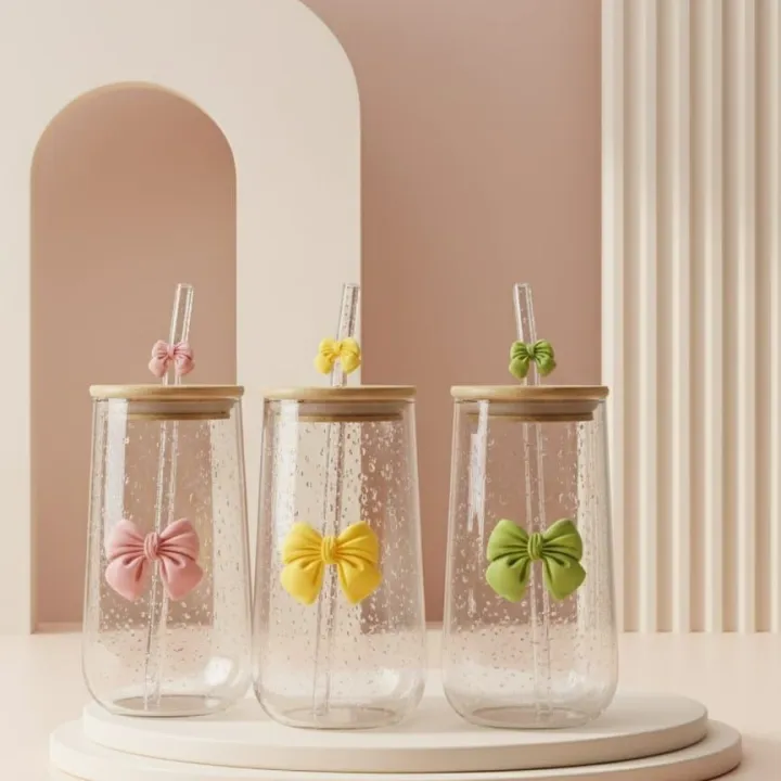 Transparent%20Bow%20Glass%20Cup%20with%20Bamboo%20Lid%20&%20Straw%20%E2%80%93%20Perfect%20for%20Juice,%20Coffee%20&%20Smoothies%20(Random%20color)%20-%20Image%202
