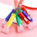 Pack of 12 Bright Mini LED Keychain Flashlight
Small Pocket Torch White
Lighting Random Color. 