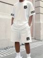 Hot Selling Summer New Men's Set with Letter Print Casual Fashion T-Shirt Short-Sleeved Shorts Sports Outdoor Set.