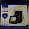 Solar Flood Lamp Jortan." Specifically, it is a 100W solar-powered floodlight.. 