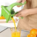 Fruit Juicer, Lemon Squeezer Hand Juicer, Portable Fruit Citrus Press Juicer – Green Colours. 