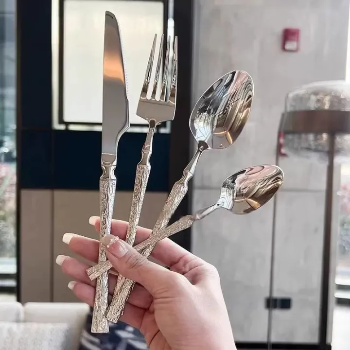 16-Piece%20Silver%20Stainless%20Steel%20Cutlery%20Set%20with%20Forks%20and%20Spoons,%20Creative%20Hammered%20Handles,%20Suitable%20for%20Home,%20Kitchen,%20Restau%20-%20Image%202