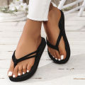 Ladies student fashion trend features pure black double strap anti-slip wear-resistant soft sole flip-flops. 
