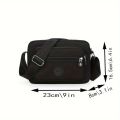 Lightweight Nylon Chic Crossbody Bag for Women - Adjustable Strap, Zip Closure, Tassel Accent, Solid Color.