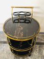 Tea Trolley circular shape golden color three shelf. 