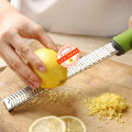 Citrus Lemon Zester & Cheese Grater-Parmesan Cheese, Lemon, Ginger, Garlic, Nutmeg, Chocolate, Vegetables, Fruits, kitchen tools. 