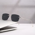 1pc Rimless Square Sunglasses for Unisex Metal Frame with Tinted Lenses Sun Shades for Driving Street Summer Outdoor Activities. 