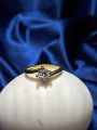 Gold Matial Ring zircon stone best quality best gift for friend and family bes zircon stone get one one free offer reasonable price. 