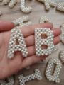 Alphabet Keychains Of Beads. 