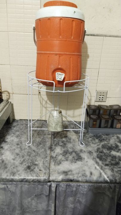 Water%20cooler%20stand%20for%20upto%2030%20litres%20water%20coolers.%20Made%20of%20prime%20quality%20iron%20frame%20having%20powder%20coating%20on%20it%20-%20Image%204