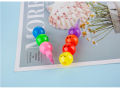 7 Color Crayons Cartoon Smiley Face. 