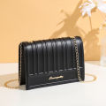 Trendy simple solid color embossed crossbody small square bag high-end vertical striped crossbody shoulder women's bag. 