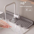 Silicone faucet draining pad, foldable and freely customizable waterproof pad, multi-functional kitchen sink splash-proof pad. 