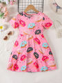 Pink cute donut full print short sleeved round neck girl's dress. 