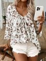 Plus Size Women Leopard Print Deep V-Neck Blouse Shirt Ladies 3/4 Sleeve Asymmetrical Shirt with Ruffled Hem & Ruched Detailing.