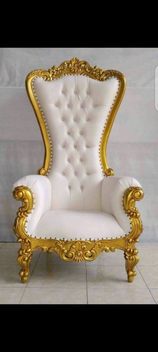 Golden High Back Chair with coffee table.