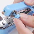 Home Handheld Sewing Machine Protable Outdoor Travel Clothes Fabrics DIY Stitchin Sew Tool Mini Manual Stitch Needlework Machine. 