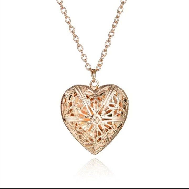 Elegant%20Vintage%20Heart%20Locket%20Pendant%20Necklace%20for%20Women%20&%20Girls%20%E2%80%93%20Gold%20Plated%20Hollow%20Carved%20Design%20%E2%80%93%20Photo%20Holder%20Gift%20Jewelry%20%E2%80%93%20Romantic%20Anniversary/Birthday%20Present%20-%20Image%206