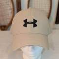 Under Armour Beige Sports Cap – Lightweight, Stylish & Comfortable. 