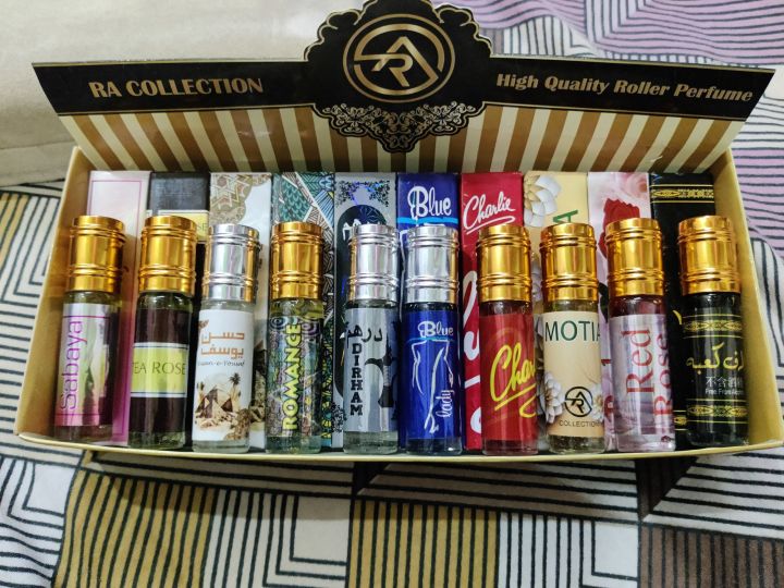 Premium%20Arabic%20Attar%20Perfume%20Oils%20%E2%80%93%20Alcohol-Free%20Long-Lasting%20Fragrances%20(Sabaya,%20Tea%20Rose,%20Husan-e-Yousaf,%20Romance,%20Dirham,%20Blue%20Lady,%20Charlie%20Red,%20Motia,%20Red%20Rose,%20Ghazal%20Kalema)%20%E2%80%93%20Roll%20On%20Attar%206ml%20Each%20-%20Image%203