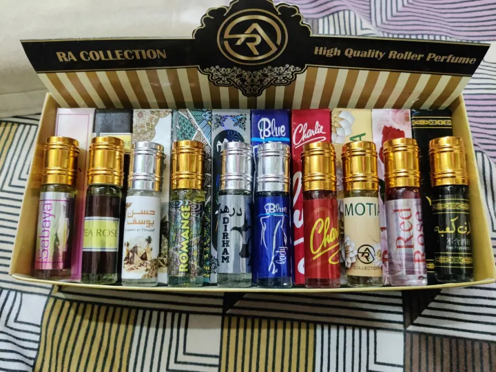 Premium%20Arabic%20Attar%20Perfume%20Oils%20%E2%80%93%20Alcohol-Free%20Long-Lasting%20Fragrances%20(Sabaya,%20Tea%20Rose,%20Husan-e-Yousaf,%20Romance,%20Dirham,%20Blue%20Lady,%20Charlie%20Red,%20Motia,%20Red%20Rose,%20Ghazal%20Kalema)%20%E2%80%93%20Roll%20On%20Attar%206ml%20Each%20-%20Image%203