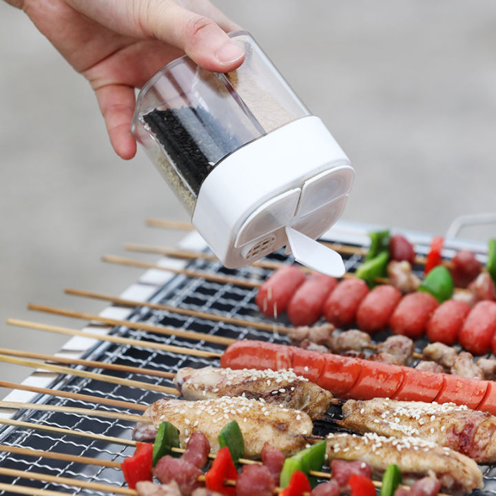 4in1%20Camping%20Seasoning%20Shaker%20Multi-Purpose%20Spice%20Jar%20with%20Lid%204-Compartment%20For%20Outdoor%20BBQ%20Cooking%20Salt%20Pepper%20Storage%20Box%20-%20Image%203
