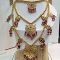 Traditional 3 Layer Dhuri Set in Manjus with Tikka and Double Jhumki – Raaikal Jewels. 
