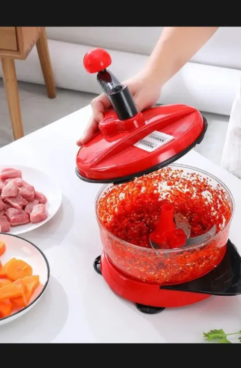 Manual%20Handy%20Chopper%20with%20sharp%20blades%20use%20for%20chopping%20vegetables,%20fruits,%20meats%20and%20salad%20-%20Image%202