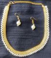 Golden small multani necklace with earrings.