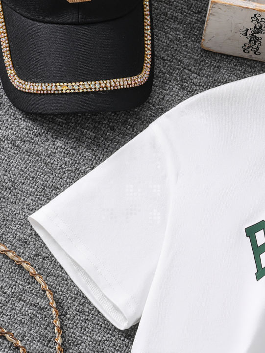 Spring/Summer%20Children's%20Fashion%20Trend%20Girls%20Athleisure%20Basic%20Three-Piece%20Letter%20Print%20T-Shirt%20Solid%20Color%20Halter%20Vest%20Sweatpant%20-%20Image%204