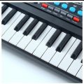 Key Piano Keyboard Toy for Kids with Mic and USB Charging Cable. 