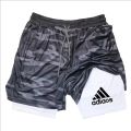 2-in-1 running shorts, suitable for men's fitness leggings, with phone pocket and simple letter print for summer sports pants.