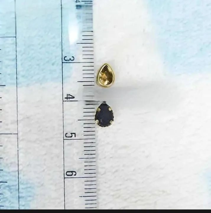 Rs.%20250%0A%0A50%20Tear%20Drop%20Shape%20white%20color%20flat%20back%20Crystal%20Kundan%20stone%20(6*4mm)%20-%20Image%203