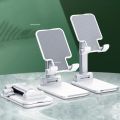 Desktop mobile Holder stand for phone adjustable foldable mobile phone stand. 