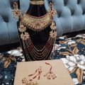 Bridal Jewellery set in Red and Golden colour with beautiful Crystal mala, bindeya and jhumer. 