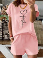 Summer Women's Fashionable Heart-Shaped Cross Print Casual Loose Round Neck Short Sleeved T-Shirt Shorts Two-Piece Set.