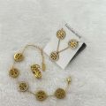 Tory  Burch jewellery set artificial gold. 