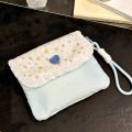 Cute floral sanitary napkin storage bag, female large capacity student portable handheld storage bag for going out. 