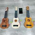 Children's toy guitar and string instrument toys, ukulele toys puzzle educational music toys stimulate children's musical talent. 