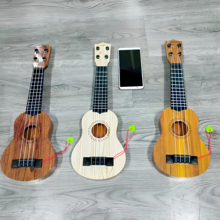Children's%20toy%20guitar%20and%20string%20instrument%20toys,%20ukulele%20toys%20puzzle%20educational%20music%20toys%20stimulate%20children's%20musical%20talent%20-%20Image%204